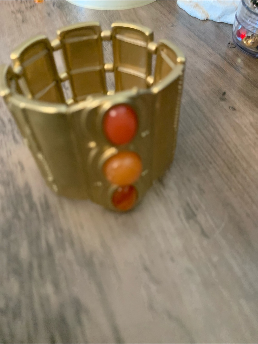 NWOT Gold-Tone Stretch Bracelet with Orange and Red Cabochons